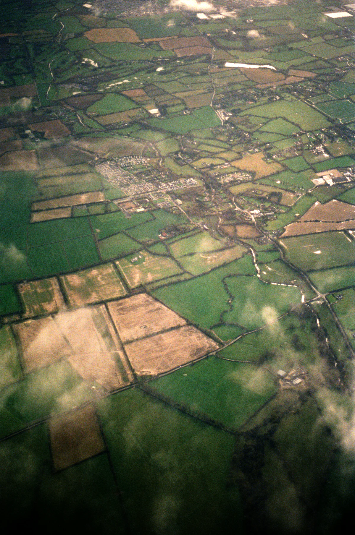 Aerial view of Indiana Corn Belt farmland in a patchwork of fields and lanes