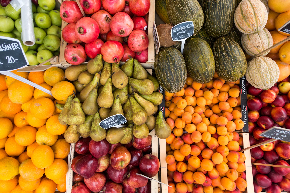 Fresh Maine produce on display at a farmers market stand
